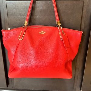 Beautiful red Coach shoulder purse with zip closure